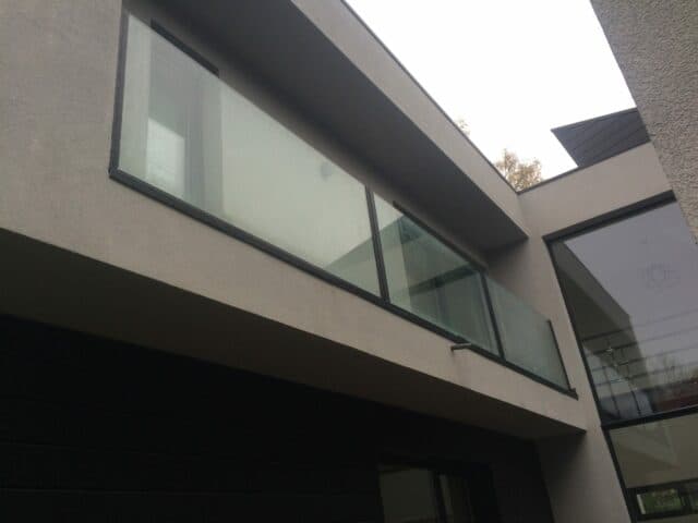 Balustrade en verre avec main courante